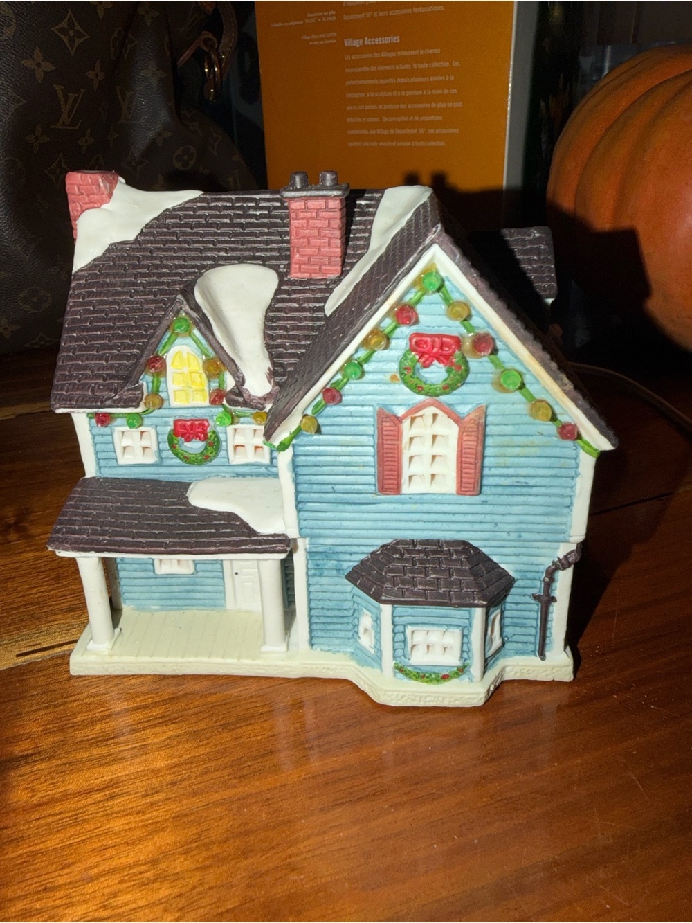 Lemax Light Holiday Ceramic House with Dark Brown Roof and Red Accents lights up